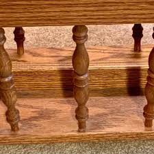 LOT:72G: Wooden Magazine Rack Side Table and Floor Lamp with Pierced Lamp Shade | EstateSales.org