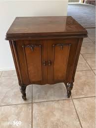 Antique White Rotary embossed sewing machine in cabinet Auction | Estate 360