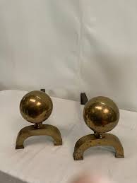 Pair of 1950's bronze andirons attributed to Jacques Adnet ...