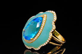 Sold at Auction: 5.00ct Blue Topaz, 0.50ctw Diamond, Quartz 18K Ring