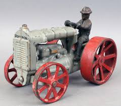 Sold at Auction: Antique Toy Tractor: Arcade cast iron ...