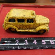 VINTAGE CAST IRON YELLOW TAXI CAB. toy car | eBay
