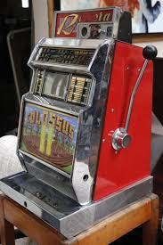 Sold at Auction: A 1960'S COLOSSUS RIVIERA ONE ARMED BANDIT FRUIT MACHINE.