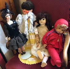 Lot - Four Bisque Dolls