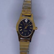 1990's Armitron Vintage Gold Tone watch with black... | Depop