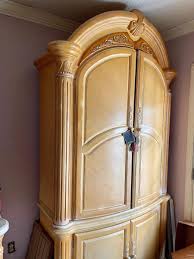 AICO by Michael Amini Armoire | EstateSales.org