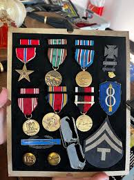 My wife is curious about her Grandfather's medals and what ...