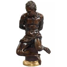 A Continental Early 19th Century Statue Of A Moorish Slave