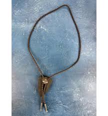 Sold at Auction: Rattlesnake Fangs & Rattle Bolo Tie