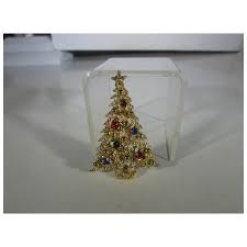 Vintage Art Christmas Tree Pin in Gold Tone with A Variety of Crystal . For Sale at Ruby Lane