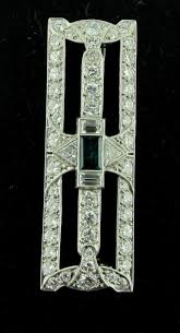 Art Deco Diamond and Emerald Brooch in Platinum, circa 1920 For Sale at 1stDibs