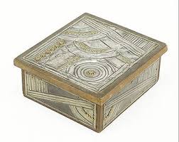 Adze Pende Decorated With A Head And Nails