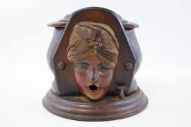 Sold at Auction: Antique Gypsy Woman Cigarette Dispenser