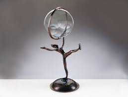 Happiness Sculpture Holding Magiscope | dreamersdo