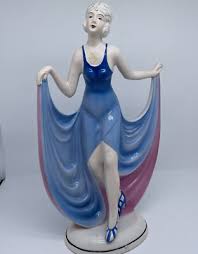 Flapper style woman figurine holding skirt Japan Vintage ...