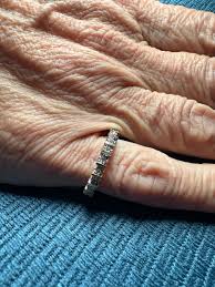 Vintage 90's 10K Diamond Eternity band. Approximately 1/2 carat