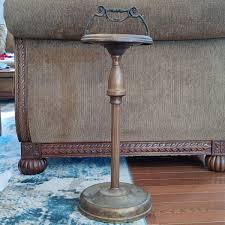 LOT 140: Vintage Metal Ashtray Stand, Blenko-Style Green Glass Ashtray, Bell & Howell 'Filmo' 8mm Movie Camera & More | EstateSales.org