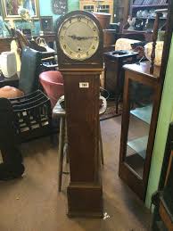 Sold at Auction: 1930's oak Granddaughter clock.