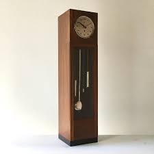 A Pendulum Table Top Grandfather Clock by Howard Miller, 1960s For Sale at 1stDibs | tabletop grandfather clock, mid century grandfather clock, antique tabletop grandfather clock