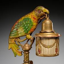 Sold at Auction: Pair Art Deco cold painted Parrot lamps
