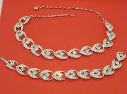 Wj15: Sarah Coventry " Enchantress" rhinestone silvertone necklace and bracelet set | EstateSales.org