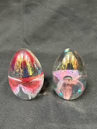 Pair of Small Art Glass Egg Paperweight Figurines Clear with Colorful Flower Inside Mt Saint Helens Ash Signed | EstateSales.org