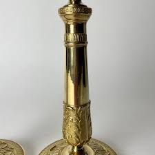 Elegant pair of Empire Candlesticks in gilt bronze from the 1820s For Sale at 1stDibs