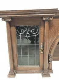 John Ednie Arts and Crafts Glasgow Oak over Mantle, Carved Cherubs and Stain Glass For Sale at 1stDibs | ednies