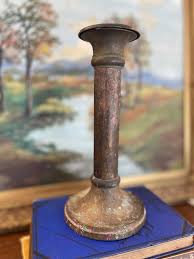 Antique Patinated Brass Toned Candlestick Holder with Wax Residue, 20th Century For Sale at 1stDibs