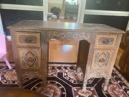 Restoring vintage furniture with sanding or painting?