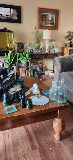 Antique shopping finds including insulators and bottles