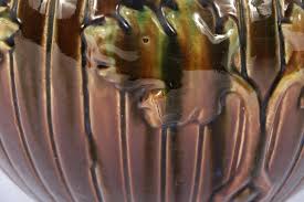 Sold at Auction: 3pc group of unmarked majolica art pottery jardiniere planters. 8"H x 9 1/4"Diam.