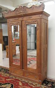 Lot - TWO-DOOR OAK WARDROBE, American, late 19th century