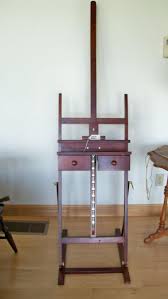 Sold at Auction: Mahogany Easel with Two Drawers