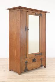 Lot 37 - A Heal & Son 'St Ives' oak wardrobe,