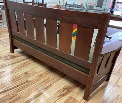 Sold at Auction: PAINE MFG CO. ARTS & CRAFTS SETTEE Early 20th Century Back height 39.5". Seat height 18". Length 75.5".