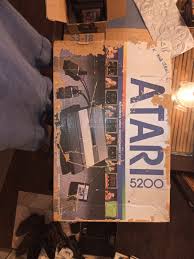 Atari 5200 game console with two controllers and three ...
