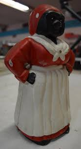 Lot - Vintage Cast Iron Aunt Jemima Coin Bank