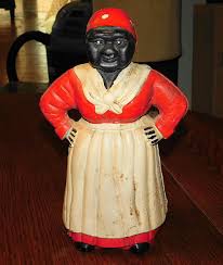 Sold at Auction: VINTAGE AUNT JEMIMA CAST IRON BANK