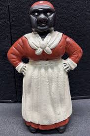 An Original Cast Iron Aunt Jemima Coin Bank