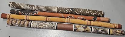 Sold at Auction: A GROUP OF 4 ABORIGINAL PAINTED DIDGERIDOOS