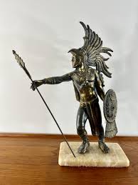 Sold at Auction: Brass Aztec warrior on marble base