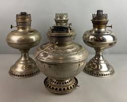 Sold at Auction: Group of 4 Vintage Metal Oil Lamps