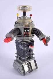 Sold at Auction: A VINTAGE ROBOT, from the film 'Lost In Space'. 27 cm high.