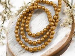30* 6mm Ochre Luster Round Druk Beads | Michaels