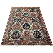 Vintage oriental hand-knotted wool rug with bird decoration ...