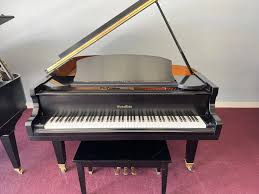 Used Pianos: Wurlitzer C153 - Valley Keyboards