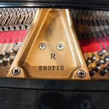 Sold at Auction: Baldwin Ebonized Model R Baby Grand Piano