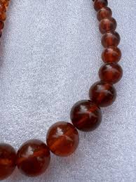 STUNNING VINTAGE TRANSPARENT BURGUNDY CHERRY BAKELITE SWIRL BEADS NECKLACE | eBay Australia