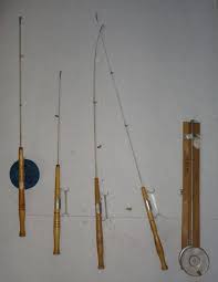 Four Old Fashion Ice Fishing Rods and One Wooden Tip Up, As ...